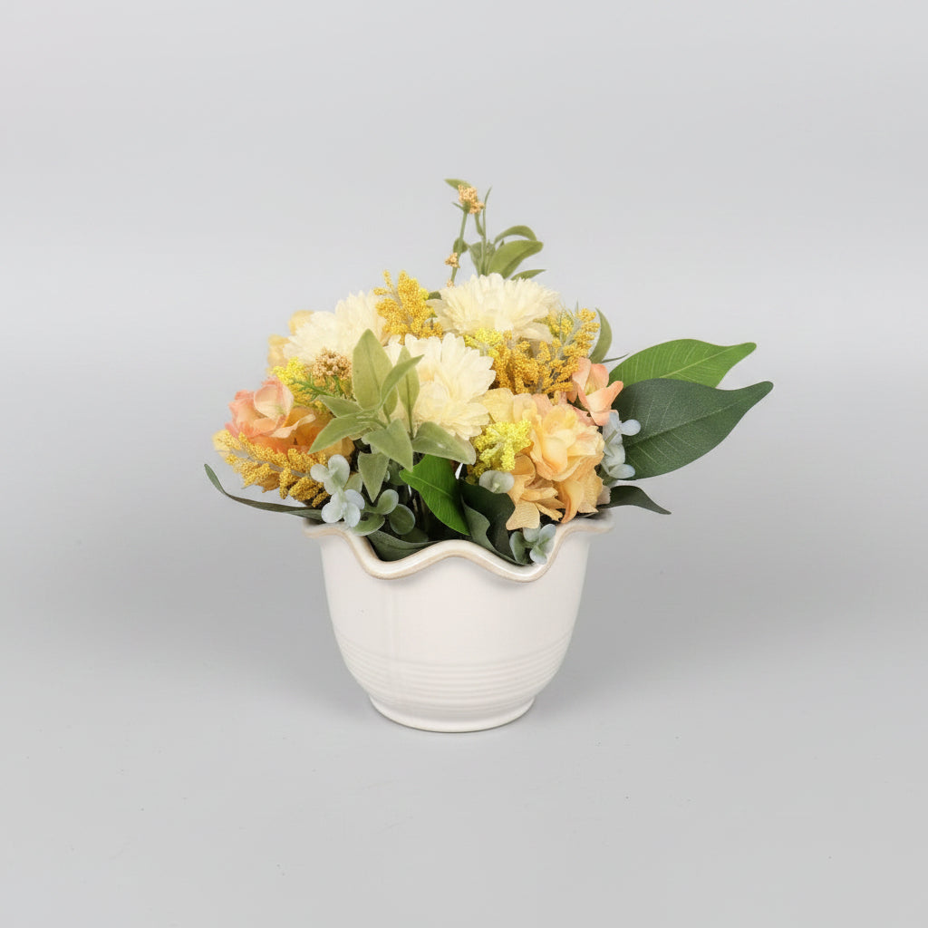 Spring flowers in ceramic, scalloped edge vase