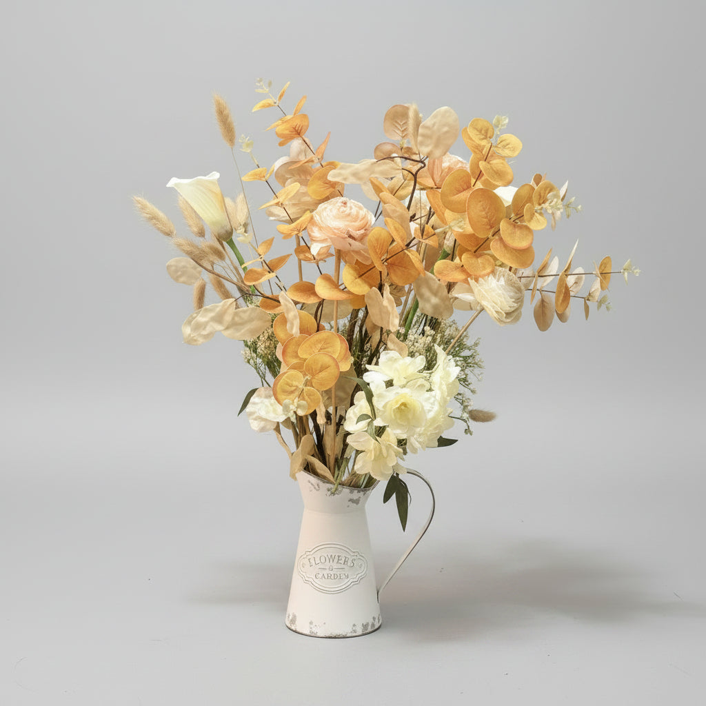 Autumn bouquet with off white rustic pitcher vase