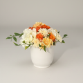 small vase with variety of blossoms