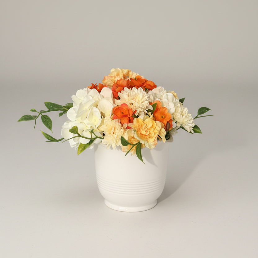 small vase with variety of blossoms